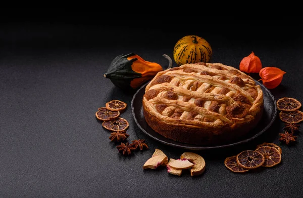 Sweet American pie with apples, pears, and cinnamon, a homemade dessert. Apple American pie as a food background for your design.