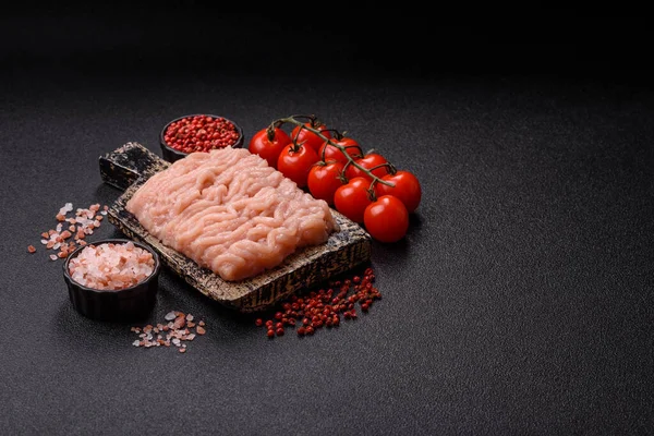 Raw minced chicken for a burger or as an ingredient in a meat dish. Raw ground chicken as a food background for your design