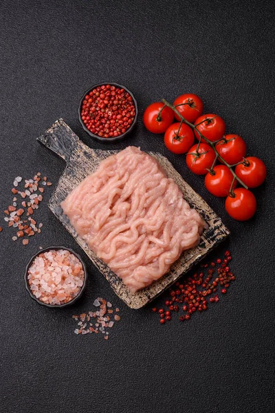 Raw minced chicken for a burger or as an ingredient in a meat dish. Raw ground chicken as a food background for your design