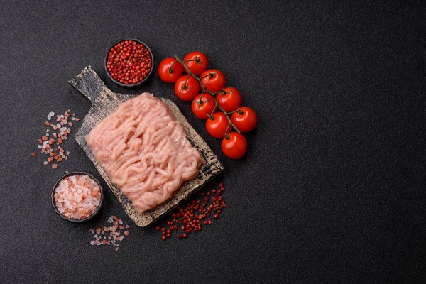 Raw minced chicken for a burger or as an ingredient in a meat dish. Raw ground chicken as a food background for your design
