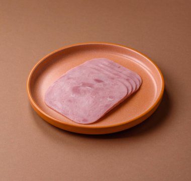 Meat, square ham sliced, organic food, protein for snacks. Sliced ham as a food background for your design