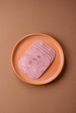Meat, square ham sliced, organic food, protein for snacks. Sliced ham as a food background for your design