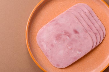Meat, square ham sliced, organic food, protein for snacks. Sliced ham as a food background for your design