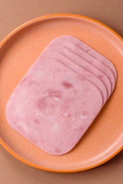 Meat, square ham sliced, organic food, protein for snacks. Sliced ham as a food background for your design