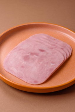 Meat, square ham sliced, organic food, protein for snacks. Sliced ham as a food background for your design