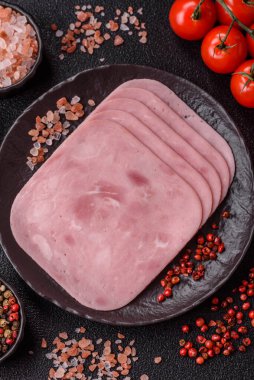 Meat, square ham sliced, organic food, protein for snacks. Sliced ham as a food background for your design