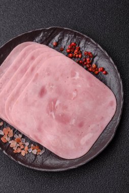 Meat, square ham sliced, organic food, protein for snacks. Sliced ham as a food background for your design