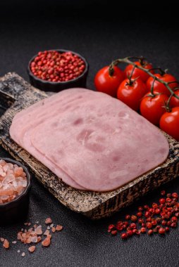 Meat, square ham sliced, organic food, protein for snacks. Sliced ham as a food background for your design