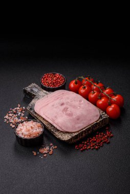 Meat, square ham sliced, organic food, protein for snacks. Sliced ham as a food background for your design