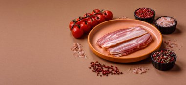 Meat, raw pork bacon sliced, organic food, protein for snacks. Raw bacon as a food background for your design