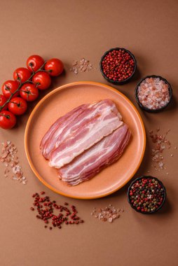 Meat, raw pork bacon sliced, organic food, protein for snacks. Raw bacon as a food background for your design