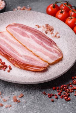 Meat, raw pork bacon sliced, organic food, protein for snacks. Raw bacon as a food background for your design