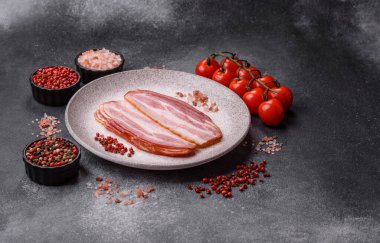 Meat, raw pork bacon sliced, organic food, protein for snacks. Raw bacon as a food background for your design
