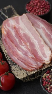 Meat, raw pork bacon sliced, organic food, protein for snacks. Raw bacon as a food background for your design