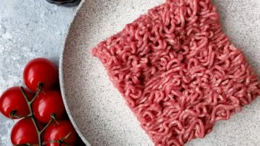 Raw ground beef for a burger or as an ingredient in a meat dish. Raw ground beef