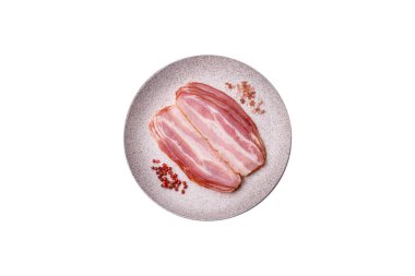 Meat, raw pork bacon sliced, organic food, protein for snacks. Raw bacon as a food background for your design