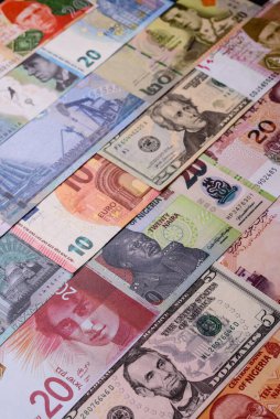 Paper money, banknotes of different countries in several denominations as a business background. Paper money and cash as a financial background for your design.