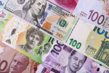 Paper money, banknotes of different countries in several denominations as a business background. Paper money and cash as a financial background for your design.