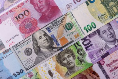 Paper money, banknotes of different countries in several denominations as a business background. Paper money and cash as a financial background for your design.