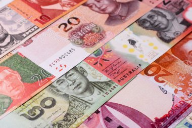 Paper money, banknotes of different countries in several denominations as a business background. Paper money and cash as a financial background for your design.