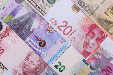 Paper money, banknotes of different countries in several denominations as a business background. Paper money and cash as a financial background for your design.