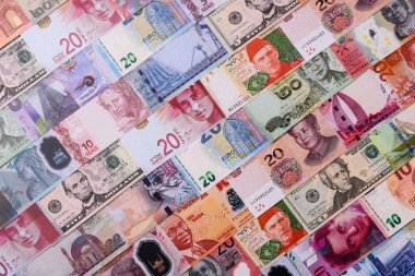Paper money, banknotes of different countries in several denominations as a business background. Paper money and cash as a financial background for your design.