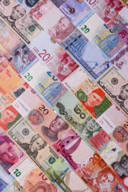 Paper money, banknotes of different countries in several denominations as a business background. Paper money and cash as a financial background for your design.