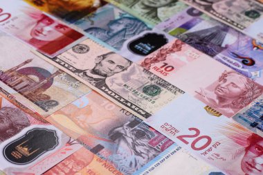 Paper money, banknotes of different countries in several denominations as a business background. Paper money and cash as a financial background for your design.