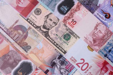 Paper money, banknotes of different countries in several denominations as a business background. Paper money and cash as a financial background for your design.