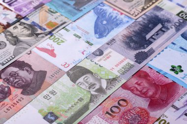 Paper money, banknotes of different countries in several denominations as a business background. Paper money and cash as a financial background for your design.