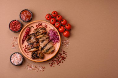 Chicken breast cooked on a grill or barbecue with sauce. Grilled chicken as a food backdrop for your design