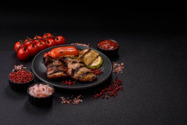 Chicken breast cooked on a grill or barbecue with sauce. Grilled chicken as a food backdrop for your design