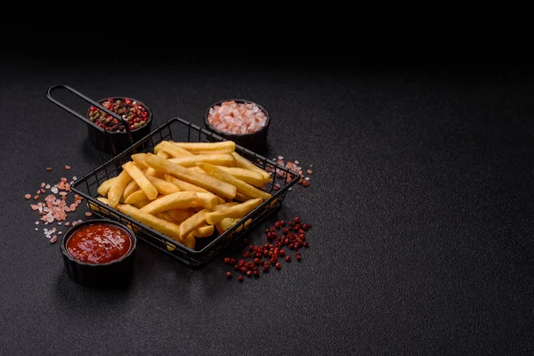 French fries are salty, crispy, and fried in oil, unhealthy takeaway food. French fries as a food backdrop for your design.