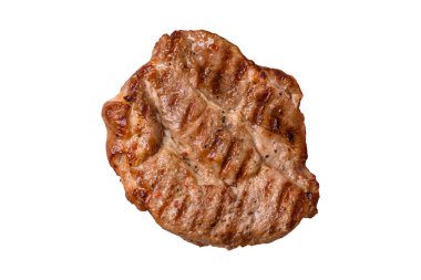 Izgara biftek ya da domuz eti, öğle yemeği için sağlıklı restoran yemeği. Mangal bifteği tasarımınız için bir yemek arka planıdır.