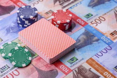 Norveç 'te kumarhane oyunu, Norveç kronu para, çip, kart ve diğer özellikler. Tasarımının arka planı olarak Norveç 'teki kumarhanelerde kumar oynadın.