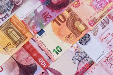 Para geçmişi, döviz kuru, farklı ülkelerden gelen kağıt banknotlar. Tasarımınız için finansal bir fon olarak para nakit para birimi