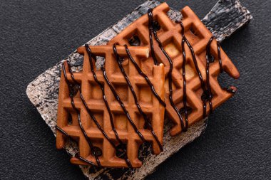 Belçika waffle 'ı, sağlıklı bir tatlı kahvaltı tatlısı, yemek geçmişi. Tasarımınız için gıda arka planı olarak Belçika waffleları
