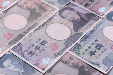 Japonya, Japon yeni kağıt banknotlar, iş için para, finansal işlemler ve anlaşmalar. Tasarımınız için finansal bir arkaplan olarak Japonca yen