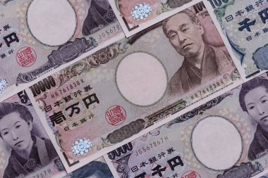 Japonya, Japon yeni kağıt banknotlar, iş için para, finansal işlemler ve anlaşmalar. Tasarımınız için finansal bir arkaplan olarak Japonca yen