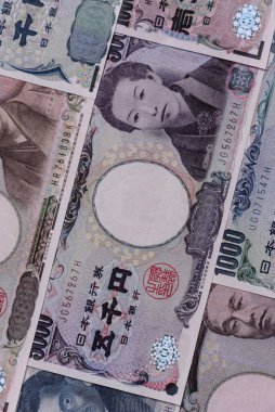 Japonya, Japon yeni kağıt banknotlar, iş için para, finansal işlemler ve anlaşmalar. Tasarımınız için finansal bir arkaplan olarak Japonca yen