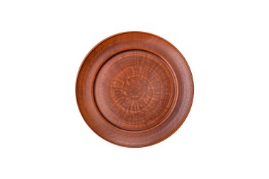 Masada boş bir seramik tabak, mutfak gereçleri. Tasarımınız için yiyecek arka planı olarak boş bir tabak