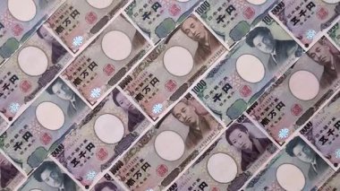Japonya, Japon yeni kağıt banknotlar, iş için para, finansal işlemler ve anlaşmalar. Tasarımınız için finansal bir arkaplan olarak Japonca yen