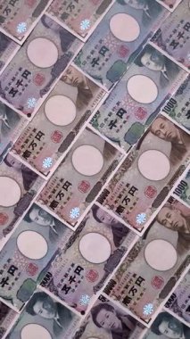 Japonya, Japon yeni kağıt banknotlar, iş için para, finansal işlemler ve anlaşmalar. Tasarımınız için finansal bir arkaplan olarak Japonca yen