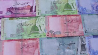 Ürdün parası, Ürdün dinarı para birimi, çeşitli mezheplerin banknotları, finansal işlemler. Ürdün parası, tasarımın için finansal bir fon olarak dinar.