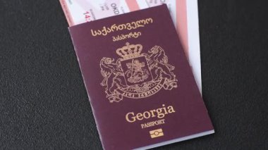 Gürcistan pasaportu, uluslararası seyahat ve tatil için Gürcistan vizesi. Tasarımınız için arka plan olarak Gürcistan pasaportu