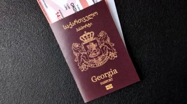 Gürcistan pasaportu, uluslararası seyahat ve tatil için Gürcistan vizesi. Tasarımınız için arka plan olarak Gürcistan pasaportu