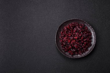 Dried sweet cranberries, natural berries for a healthy diet. Dried cranberries as a food background for your design