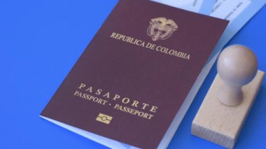 Kolombiya pasaportu, uluslararası seyahat ve tatil vizesi. Tasarımınız için arka plan olarak Kolombiya pasaportu