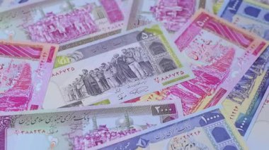 İran Cumhuriyeti parası, lira parası, çeşitli banknotların banknotları, finansal işlemler. Tasarımının finansal geçmişi olarak İran parası ve lira.