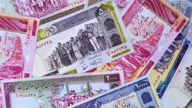 İran Cumhuriyeti parası, lira parası, çeşitli banknotların banknotları, finansal işlemler. Tasarımının finansal geçmişi olarak İran parası ve lira.
